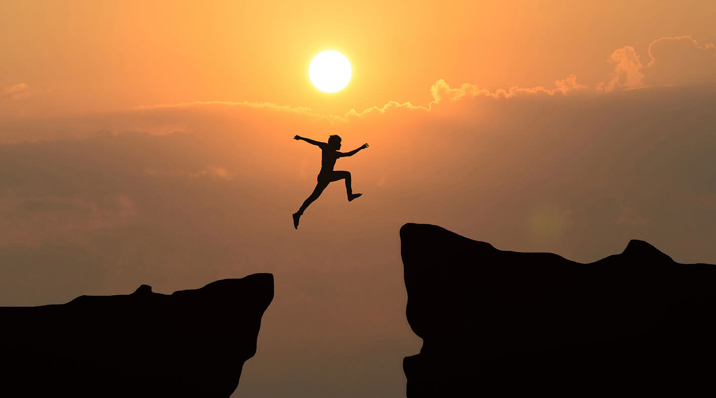 A boy jumping the mountain image showing courage for Balaji Formalin