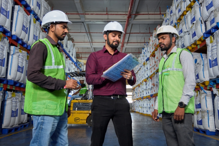 Employees discuss with each other about formaldehyde products stock